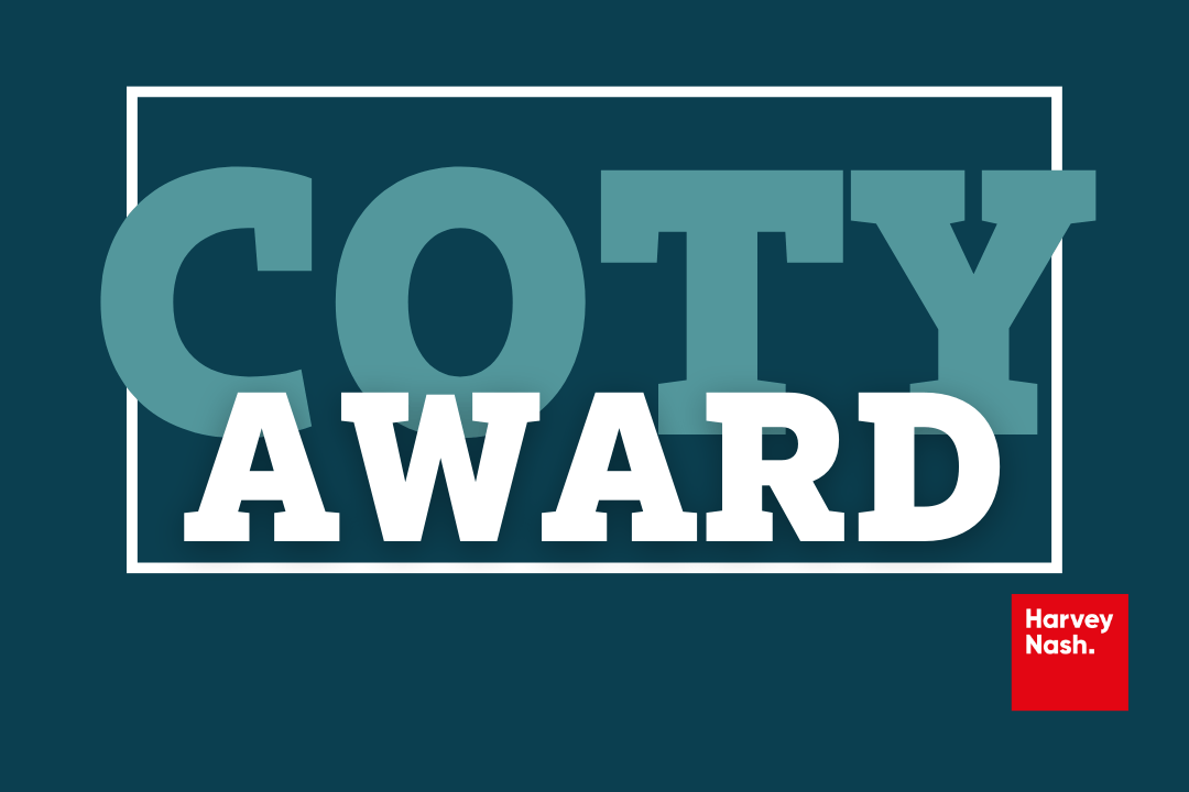 Blue background with 'COTY Award' and Harvey Nash logo 