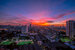 The high angle background of the city view with the secret light of the evening, blurring of night lights, showing the distribution of condominiums, dense homes in the capital community of Bangalore India