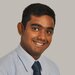 Udara Perera, Chartered Engineer from AtkinsRéalis. smiling and wearing a formal short 