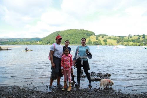 image of Michelle with her family at the beach