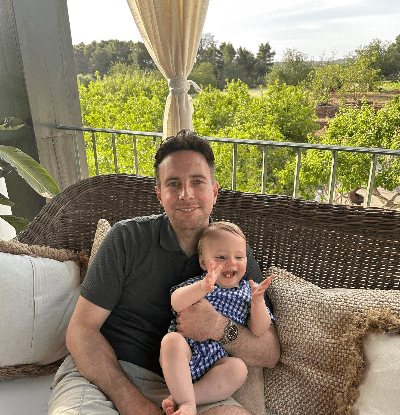 Photo of Luke with his child