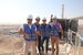 Four AtkinsRealis engineers working in the Middle East