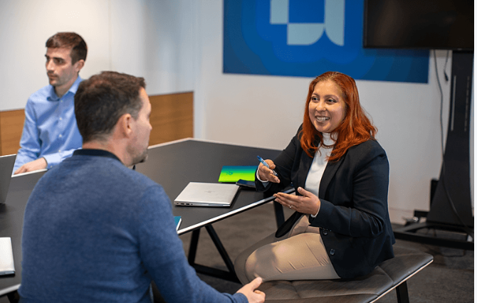 two employees chatting in the office