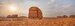 Tomb Lihyan Son of Kuza or Qasr al-Farid at Hegra, Saudia Arabia - most popular landmark in Mada'in Salih archaeological site, sandy desert landscape, morning sun background - high resolution panorama