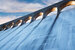 water rushing down a reservoir dam at a hydro power station