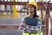 India construction woman working with document at precast site work