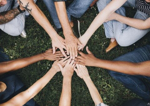 team sitting around lunch table