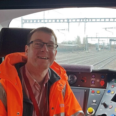 Ivan and his colleague working on the snowy rail track