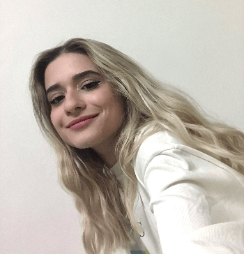 Photo of Corinna smiling towards the camera