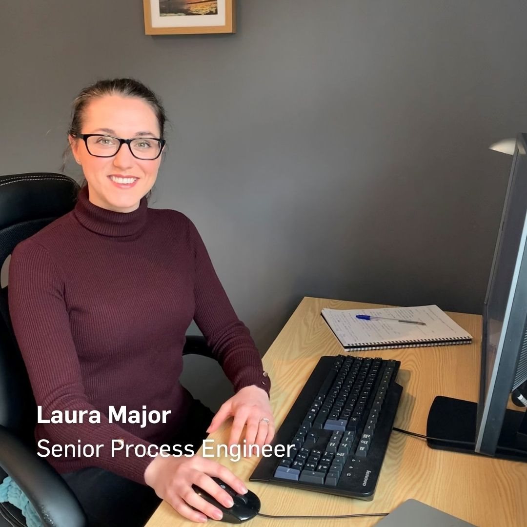 image of Laura at her desk