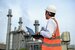 Nuclear engineer working with laptop at Gas turbine electrical power plant