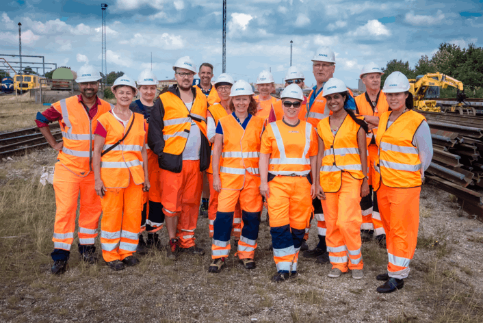 this is a image of a team wearing high visibility clothing
