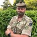 Paul in his army uniform looking towards