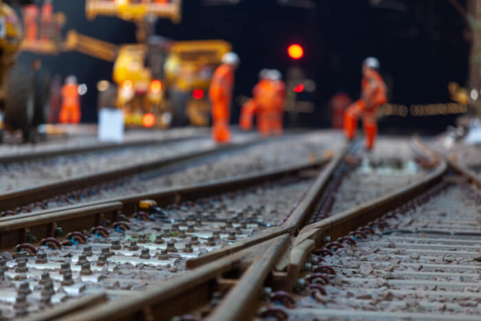 railway workers on the tracker doing maintenance work