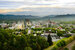 The skyline of downtown Asheville, North Carolina at sunset with mountains in the background