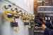 An electrical engineer inspecting wires