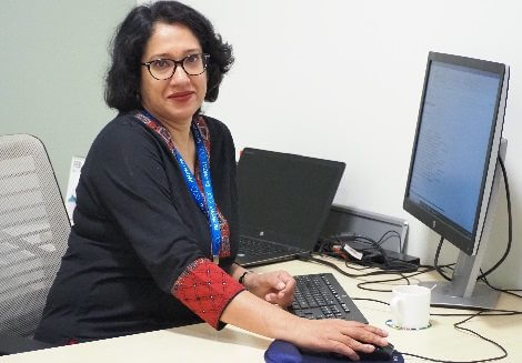 Professional team member on a computer