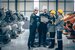 Group of engineer team stand talking together. Industry engineering teamwork people discussion.