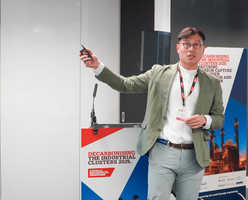 Photo of Shengke speaking at a recent decarbonization cluster conference