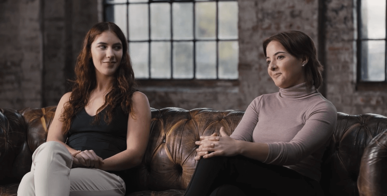 Two women at a meeting