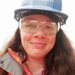 Charlie Rawlings wearing a hard hat and safety goggles smiling at the camera