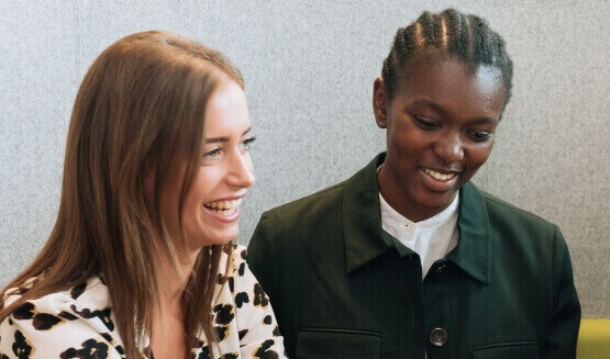 two women smiling