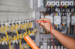Electrical engineer fixing wiring.