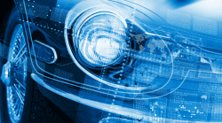 Image of a car showing the headlight and wheel