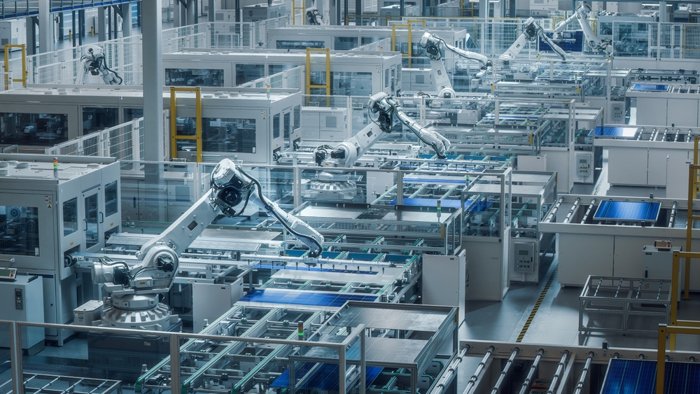 Large Production Line with White Industrial Robot Arms at Modern Bright Factory