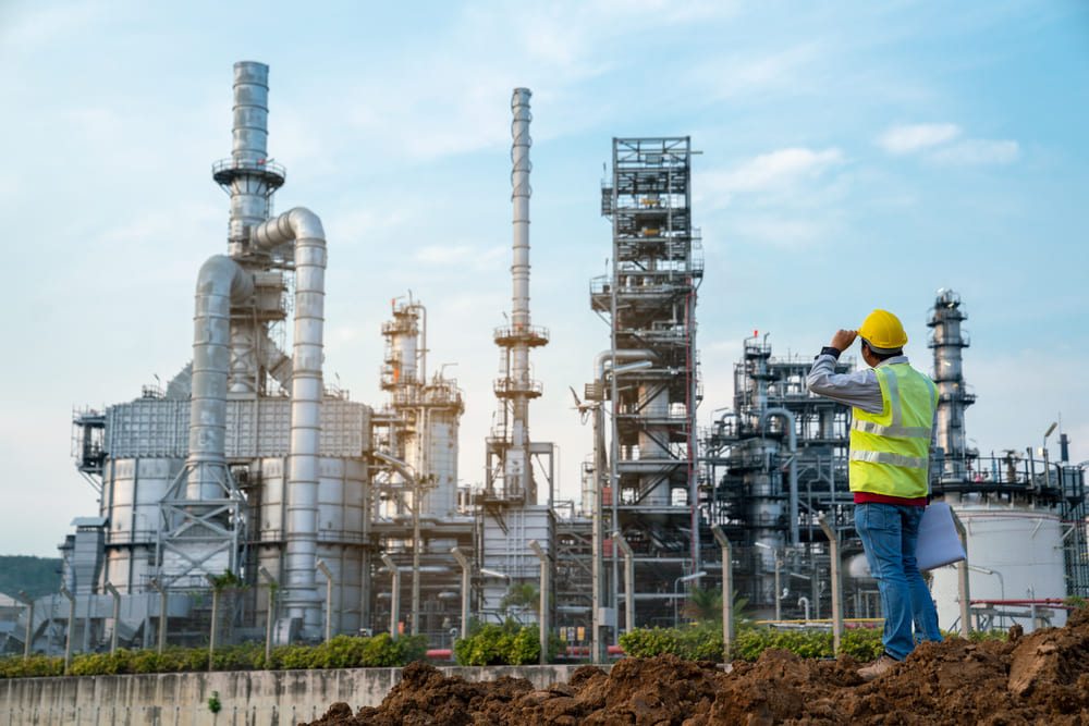 Refinery industry engineer wearing PPE Working at refinery construction site