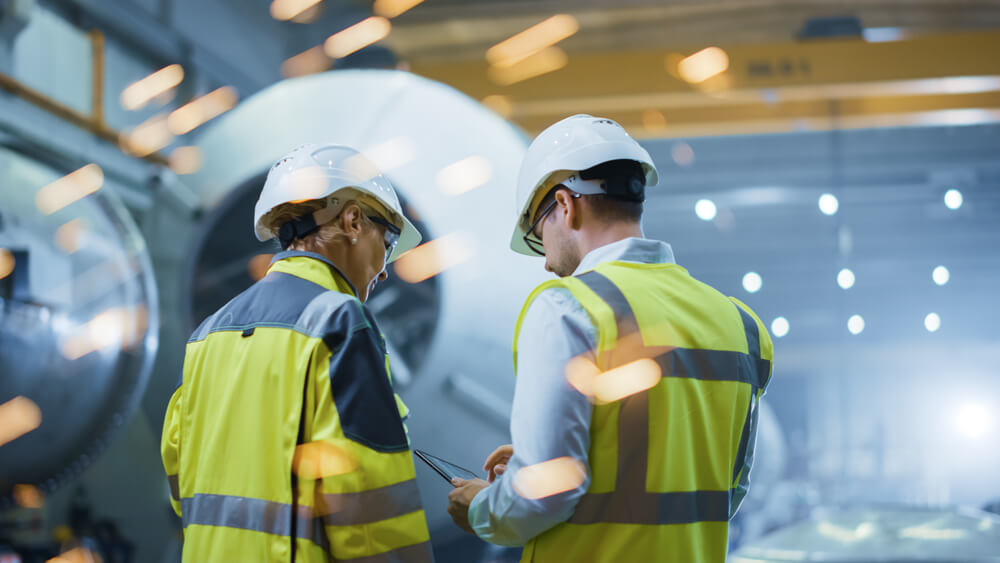 two engineers with protective equipment