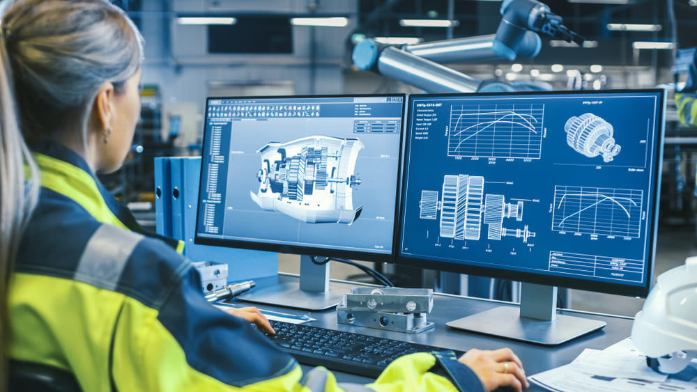 Female Mechanical Engineer Designs 3D Engine on her Computer