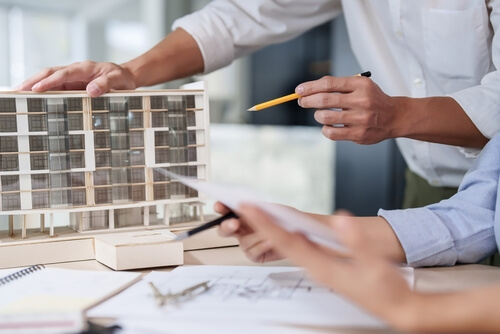 Architects designing a building