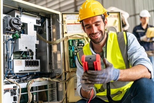 Electrical technician working on electric 