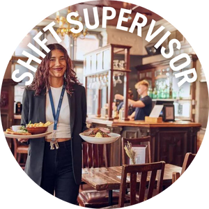 Shift Supervisor takes food to table in pub. Banner reads 'Shift Supervisor'