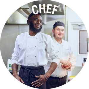 Two chefs standing in a kitchen. Link to Chefs Jobs