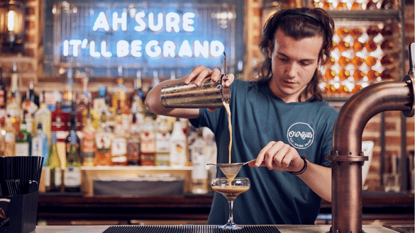 Bar Team Member makes a cocktail in O'Neill's