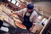 chef making pizza