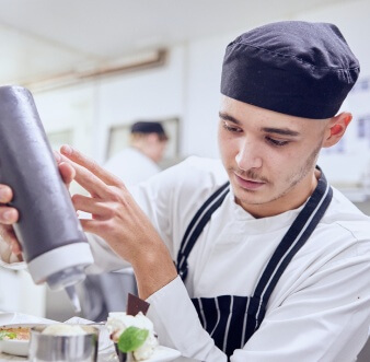 chef decorating a plate