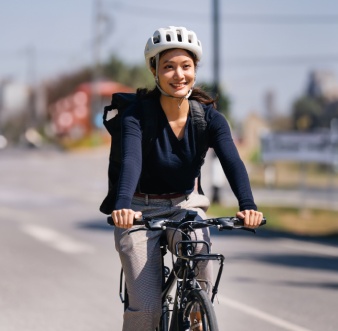 a woman commuting to work on a bike