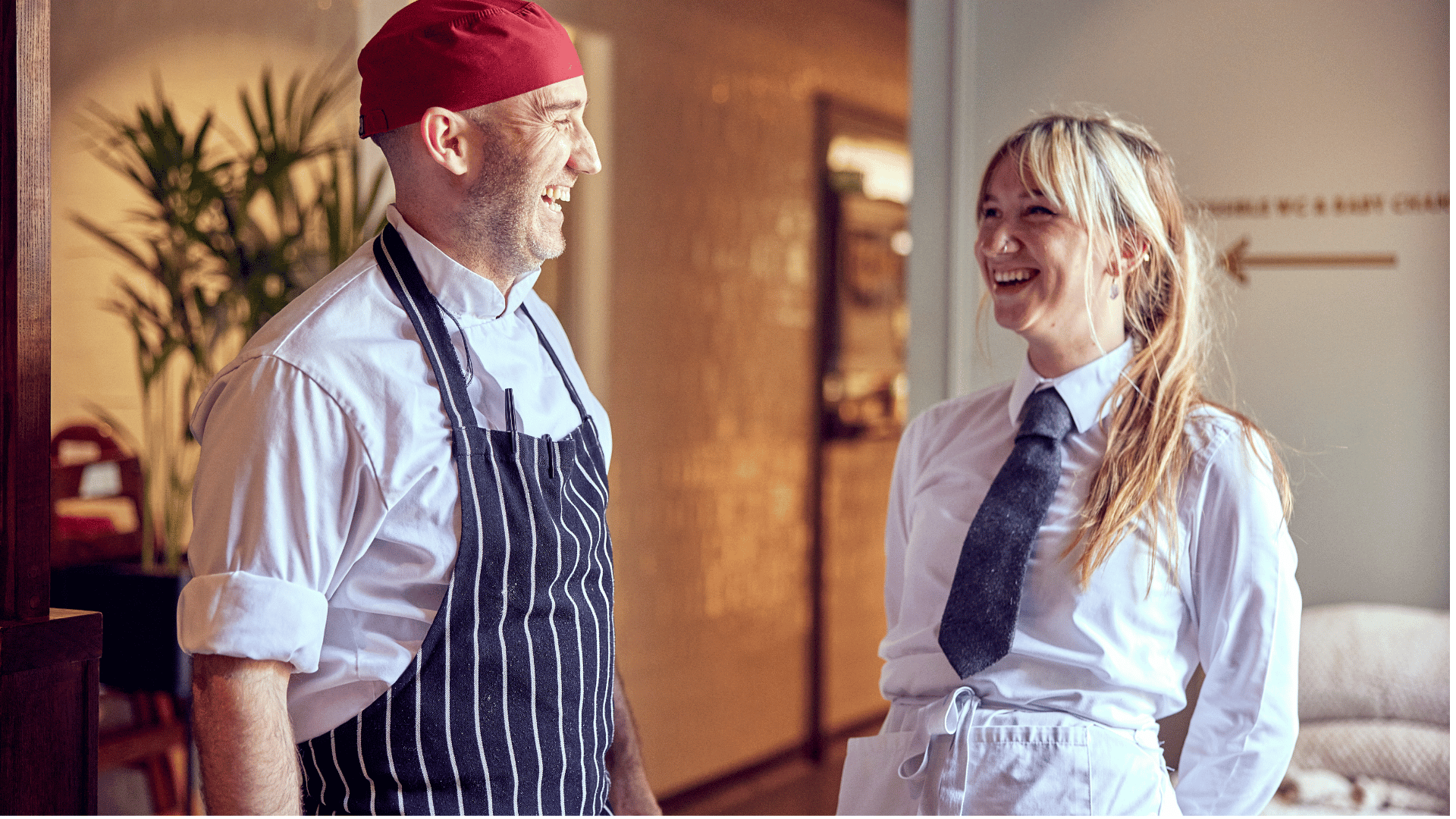 two friends making cocktails