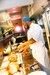 male chef cooking in restaurant kitchen