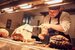 image of chef carving meat in the kitchen