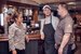 duty manager talking to chef and wait staff at pub