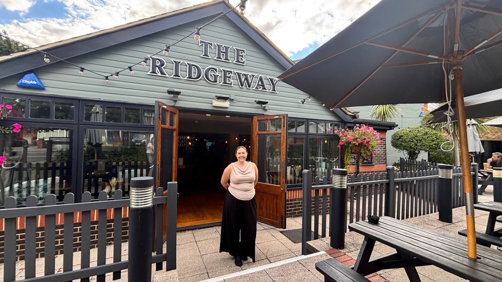 image of lauren standing outside ember inns pub 