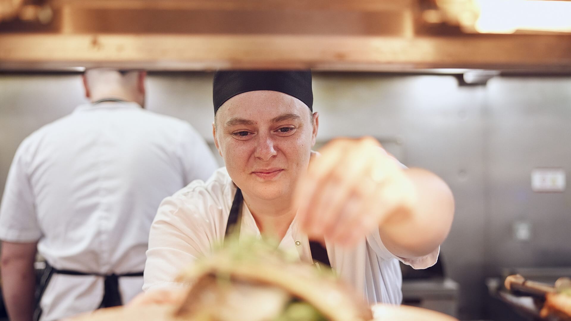 image of M&B chef seasoning food 