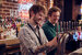 Two barmen pouring pints