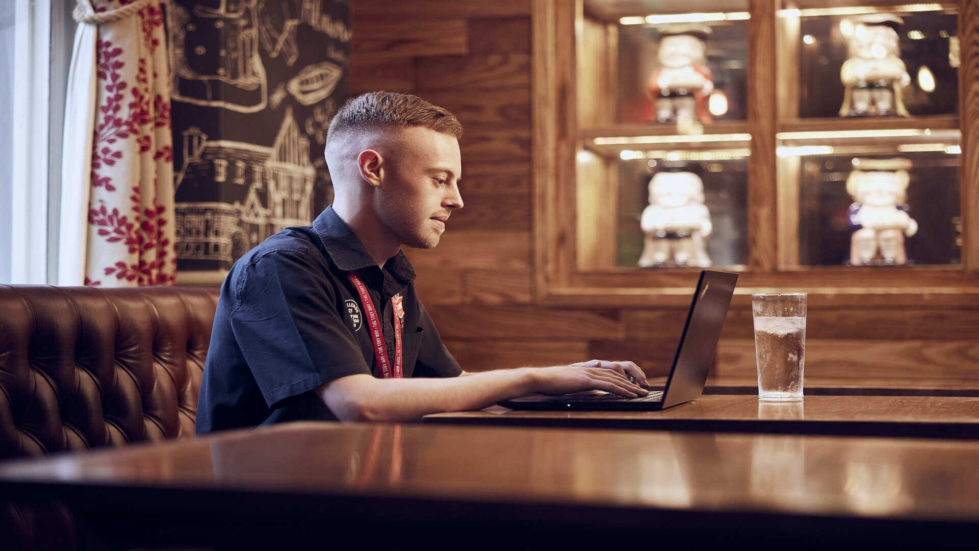 image of person writing cv on their laptop 
