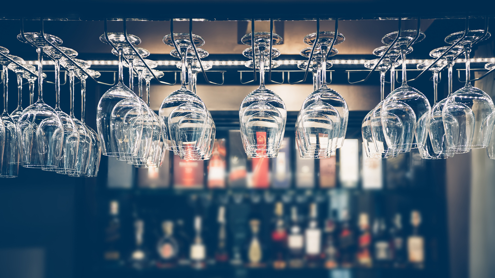 wine glasses hanging upside down in restaurant