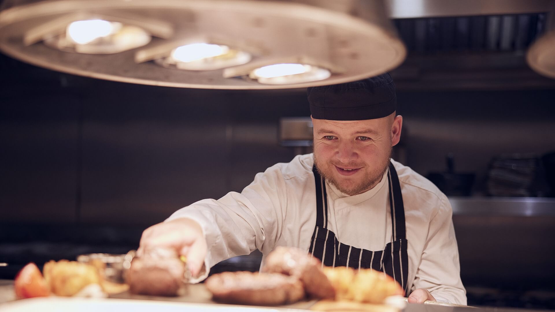 image of kitchen team leader in kitchen 